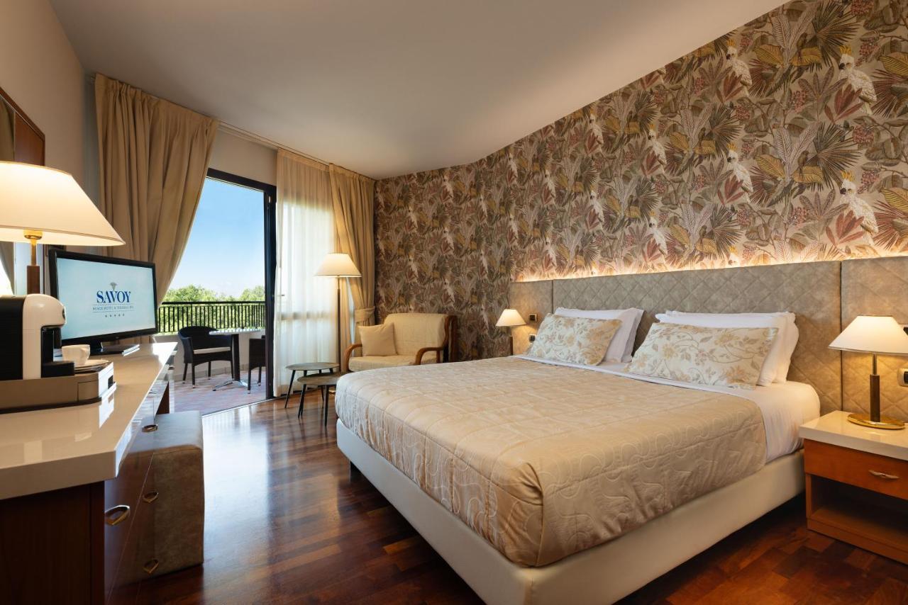 Savoy Beach Hotel & Thermal Spa Бибионе Екстериор снимка A room at the hotel